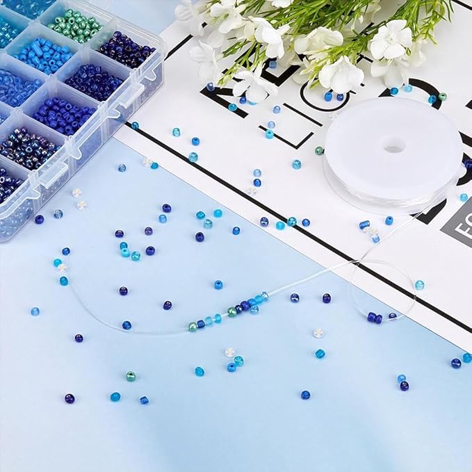 NBEADS 15 Colors 6/0 Glass Seed Beads, About 3000 Pcs 4mm Blue Round Pony Beads Mini Spacer Loose Beads for Jewelry Design Necklace Bracelet Earring Making