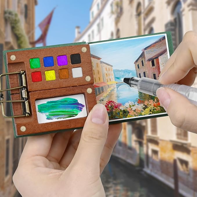 Mini Portable Watercolor Palette Set–Complete Travel Watercolor Set with 12 Watercolor Paints, Wooden Grid Paint Box, Mini Sketch Book, Masking Tape, 6 Brush Pens & Binder Clips