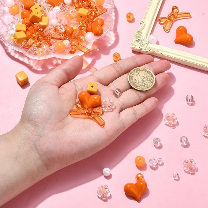 Ipotkitt 130 Pcs Acrylic Mixed Shape Beads Orange Color Beads Heart Round Bowknot Cube Barrel Spacer Beads for DIY Necklace Bracelets Jewelry Making
