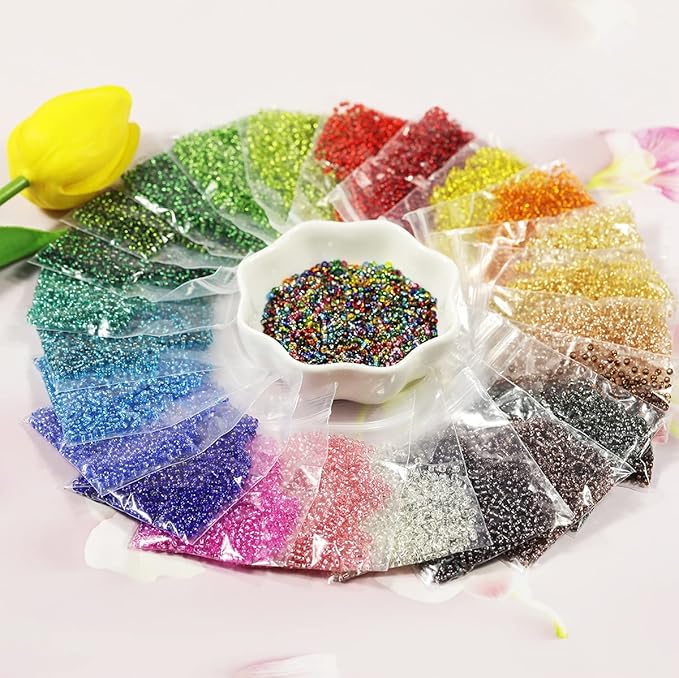 About 21000pcs 2mm 12/0 Glass Seed Beads 24 Colors Loose Beads Kit Bracelet Beads with 24-Grid Plastic Storage Box for Jewelry Making