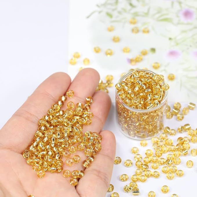Bala&Fillic Clear Golden Silver Lined Color 4mm Seed Beads About 1200pcs/100Grams in Bag, 6/0 Glass Craft Beads for Making Bracelet and Necklace (Clear Golden Lined)
