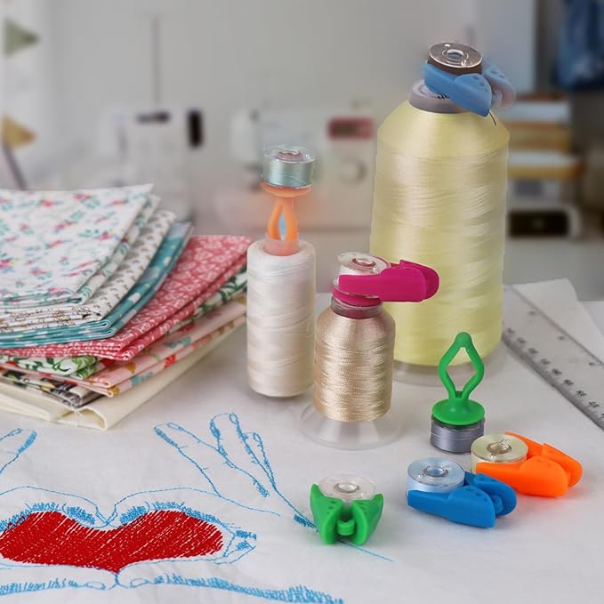 New brothread 100pcs Mix Sewing Notion (50 Bobbin Holders + 50 Bobbin Clamps) - Prevent Bobbin Thread Tails from Unwinding - Best Organizer for Most Sizes of Bobbin Thread Spools