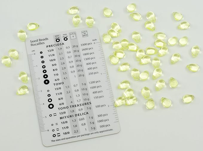 Czech 50-Piece Glass Beads, 6x9mm, Teardrop Transparent Yellow Uranium Glass (Glows Under UV)