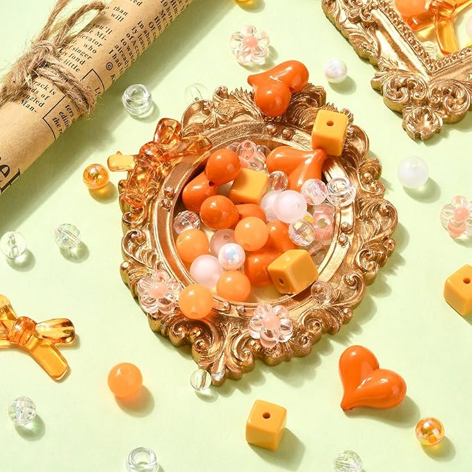 Ipotkitt 130 Pcs Acrylic Mixed Shape Beads Orange Color Beads Heart Round Bowknot Cube Barrel Spacer Beads for DIY Necklace Bracelets Jewelry Making