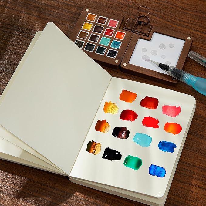 Mini Paint Palette Travel Kit - 15-Colors Pocket Artist Water Color Travel Set with Crossbody Bag, Watercolor Journal, Metal Clip, Paint Water Cup, Water Brush, Wooden Paint Box for Painters Artists