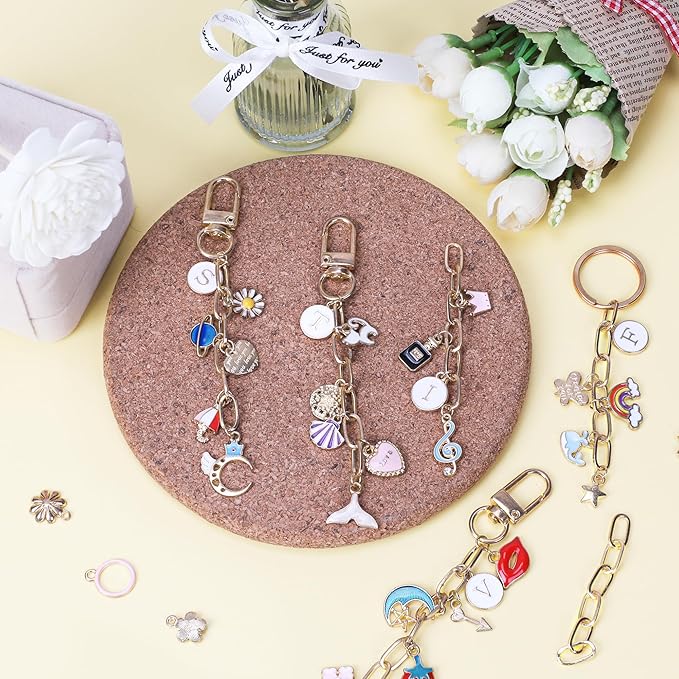 Starry 105Pcs Keychain Making Kit DIY Bag Charm Kit 30 Charms 8 Keychain Clips with Key Ring,Key Chain Kit 8 Extender Chain Swivel Snap Hooks Gold Charms 50 Jump Ring DIY Craft Supplies